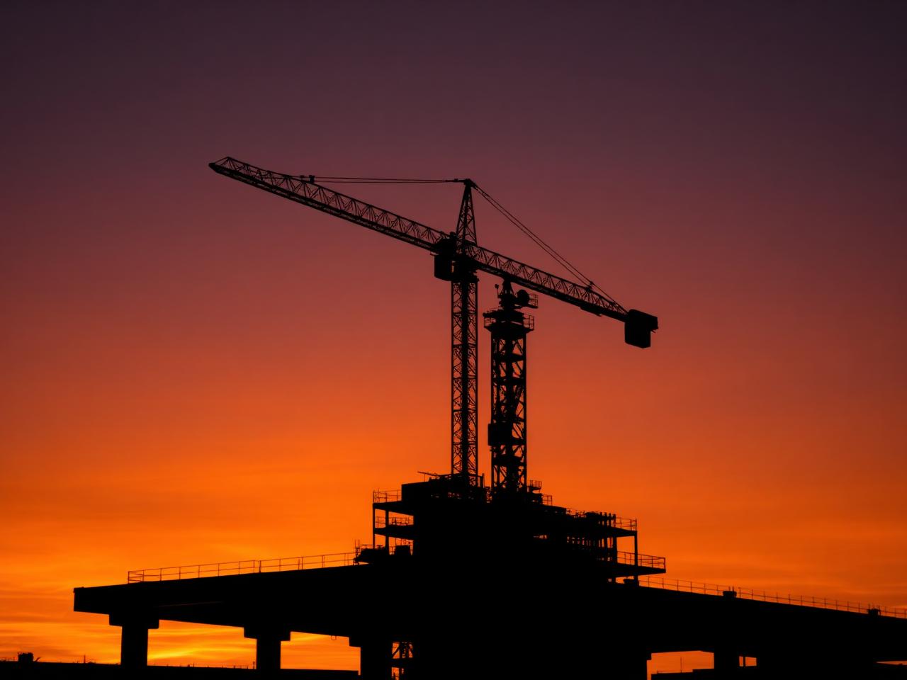 Construction crane at dusk